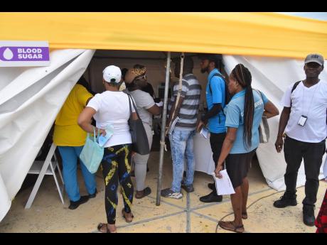 Persons waiting to get their blood sugar checked  during the ‘Know Your Numbers’ screening campaign.