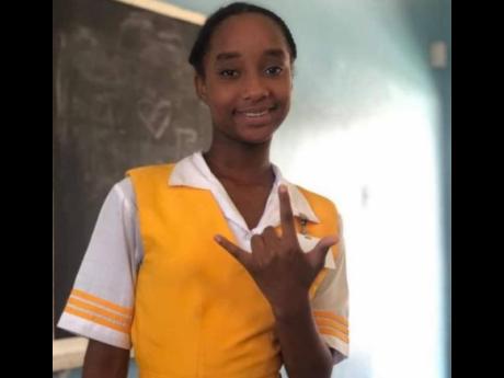 14-year-old Martina James of Donald Quarrie High School has 12 medals in Taekwondo