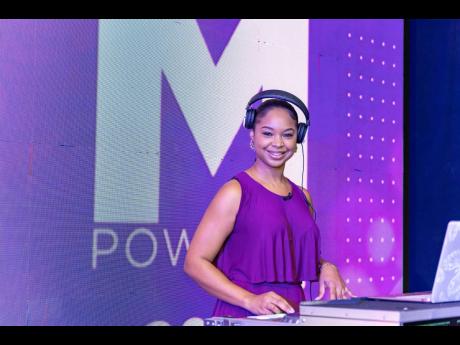 DJ Yolo shares a dazzling smile with the lens as she entertains the participants of the 5th Annual MPowered Continuing Education Seminar at the MDS Studio.