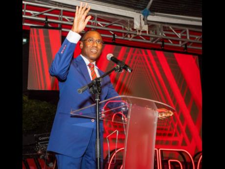 Dr Nigel Clarke, minister of finance and the public service, addresses the rebranding ceremony of CIBC at the bank’s New Kingston headquarters on January 31.