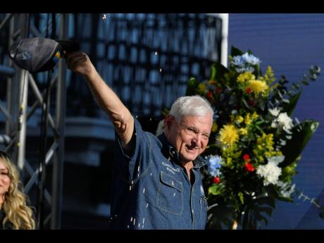 Panama’s former President Ricardo Martinelli waves to supporters during a campaign rally in Panama City on Saturday, February 3. Panama’s Supreme Court on Friday denied an appeal from Martinelli, who is convicted of money laundering in the case of a me