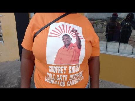 A supporter of the People’s National Party’s Godfrey Knight, candidate for the Toll Gate division in Clarendon. 