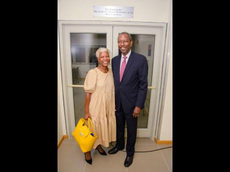 Justice C. Dennis Morrison with his wife Janet.