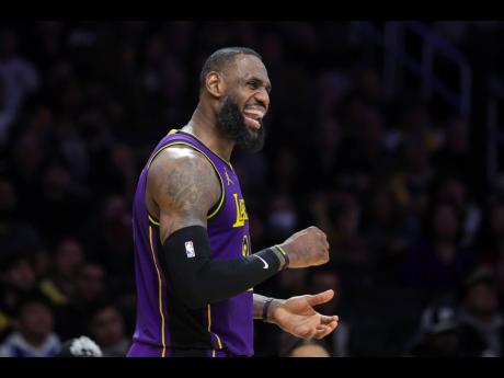 Los Angeles Lakers forward LeBron James celebrates during the second half of the team’s NBA basketball game against the New Orleans Pelicans on Friday, February 9, 2024, in Los Angeles. 