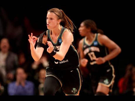 Credit: AP
New York Liberty guard Sabrina Ionescu (20) reacts after making a 3-point basket against the Connecticut Sun in the second half during a WNBA basketball game on May 7, 2022, in New York.