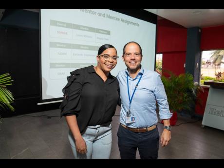 Heineken Brand Manager Amoye Phillpotts Brown gleefully joins her mentor and Red Stripe Managing Director Daaf Van Tilburg after successfully guessing her match. 