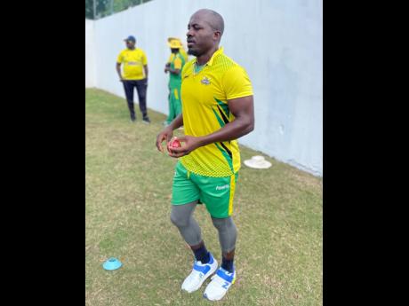 Credit: Lennox Aldred Derval Green, who returns to the Jamaica Scorpions squad, gets ready to bowl during a net session at Sabina Park yesterday.