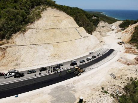 This April 2023 aerial photograph shows work in progress on the paving of the roadway from Harbour View to Albion.