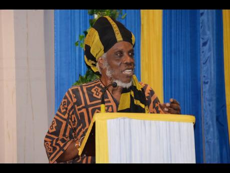 Mutabaruka addresses the session.