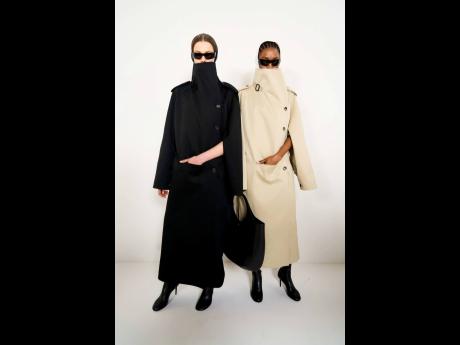 SAINT’s Dru Campbell (right) and Famke van Hasselt, backstage at the Courrèges Fall/Winter 2024 show.