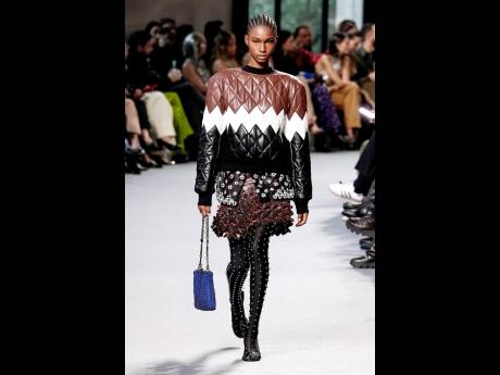 Booked by in-demand casting director Piergiorgio Del Moro, Dru Campbell bundled up in this cosy look at Rabanne on Thursday.