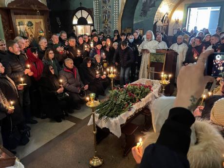 Relatives and friends pay their last respects at the coffin of Russian Opposition Leader Alexei Navalny in the Church of the Icon of the Mother of God Soothe My Sorrows, in Moscow, Russia, yesterday.