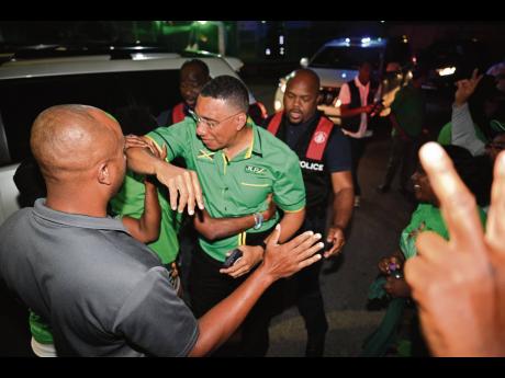 Jamaica Labour Party Leader Andrew Holness arrives at the party’s Belmont Road, New Kingston, headquarters on the evening of the local government election on Monday, February 26. 