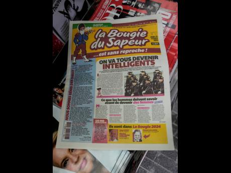 The satirical French newspaper ‘La Bougie du Sapeur’ is photographed at a newspaper shop in Paris, on Thursday, February 29, 2024. Satirical French newspaper La Bougie du Sapeur only comes out on February 29, once every four years. Some friends started