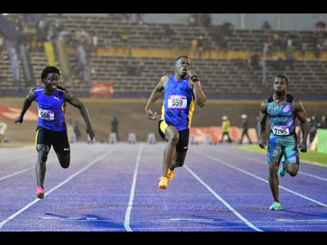 Credit: Gladstone Taylor
Nigel Ellis (centre) of Elite Track Club wins a heat in the men’s 100 metres at the Gibson McCook Relays on February 24. Gibson McCook Relays held at the National Stadium in St Andrew on Saturday, February 24, 2024.