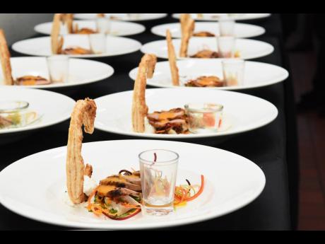 Crispy braised duck breast, warm sake with ginger, and soya sauce reduction.