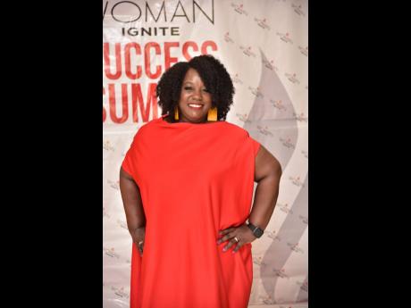 Spurr Open’s Khamiele Lawrence is the lady in red. 