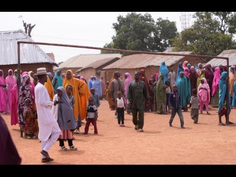 Parents wait for news about the kidnapped LEA Primary and Secondary School Kuriga students in Kaduna, Nigeria.