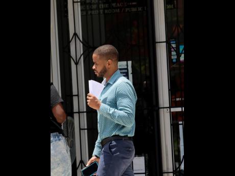 Councillor David Brown leaving the St James Parish Court moments after his case for assault was heard in July 2023.