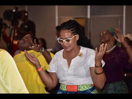 Credit: Antoine Lodge Moved by the testimonies, the audience broke out in worship.