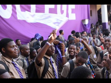 Kingston College students celebrate winning their 34th ISSA/GraceKennedy Boys and Girls Athletics Championships at their North Street location on April 3, 2023.