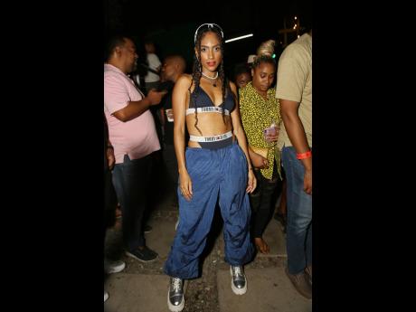 Credit: Nathaniel Stewart ‘Paradise Plum’ singer Naomi Cowan rocking a sporty ‘90s-inspired fit to headline with the other ladies of the Rock and Groove riddim.