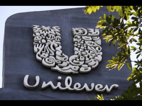 Credit: AP Tatan Syuflana A Unilever logo is displayed outside the head office of PT Unilever Indonesia Tbk in Tangerang, Indonesia.
