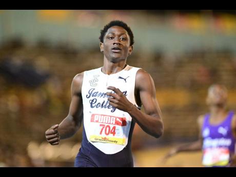 Jamaica College’s Oneil Lawrence easily captured the first semi-final of the Class Three boys' 200 metres in 22.54 seconds at the ISSA/GraceKennedy Boys and Girls' Athletics Championships at the National Stadium tonight.