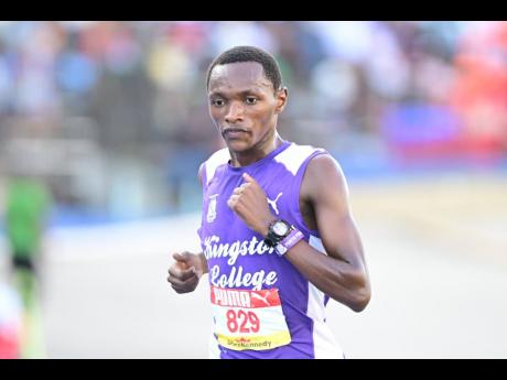 Kingston College’s Ethan Gioko won the Open boys' 5,000 metres easily at the ISSA/GraceKennedy Boys and GIrls' Athletics Championships at the National Stadium today.