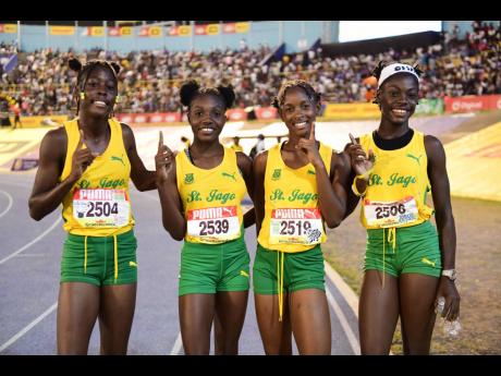 Credit: Gladstone Taylor St. Jago High's Class Three girls 4x100 metres members celebrate their victory at the ISSA/Grace Kennedy Boys and Girls' Athletics Championships at the National Stadium tonight.