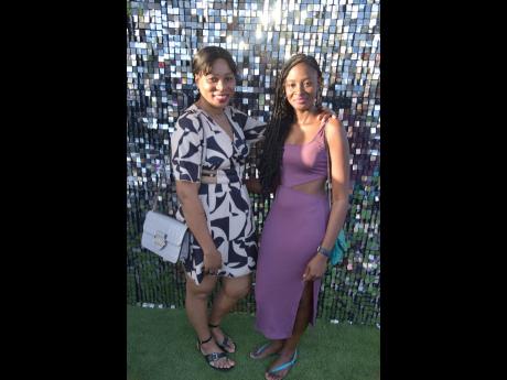 Credit: Antoine Lodge Janette Brown (left) and Shernette Clarke basking in the afternoon sun in wonderful fashion before entering the exhibition.