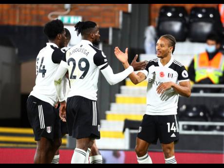 Fulham’s Bobby Decordova-Reid (right)