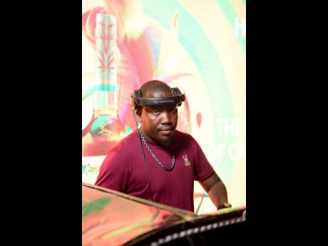 Gavin 'Mafia' Whylie of the X-Factor Sounds was in his element as he commanded the turntables at the Hennessy Carnival Pop-up at Ribbiz Ultra Lounge.