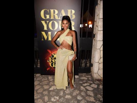 No stranger to elegant attire, Miss Jamaica World 2022 Shanique Singh shines in this custom Tamia Carey piece. 