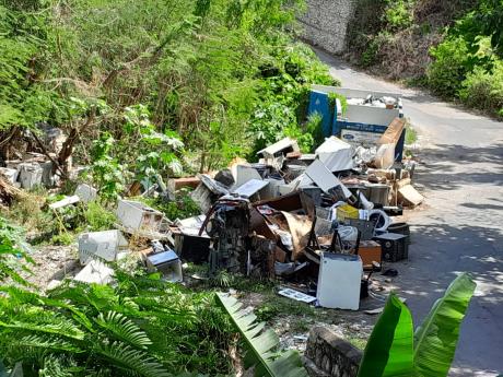 The pile of metals dumped along the roadside in River Gully in Hanover.