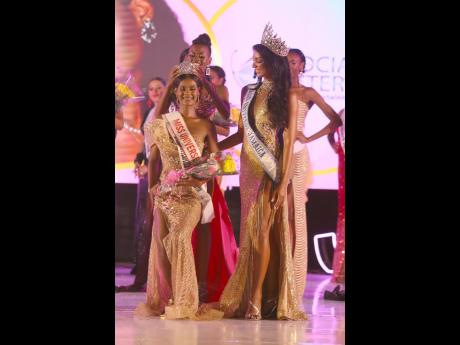Gordon crowns Greenwood, Miss Universe Jamaica East and Miss Universe Jamaica 2023 Dr  Jordanne Lauren Levy looks on.