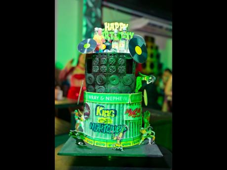 Credit: Contributed The Wray & Nephew-inspired cake drew many eyes and cameras.