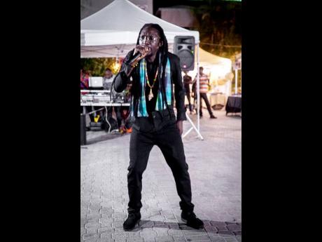 Reggae singer from Surinamae,  Jah Nelson,  performing at Night Market in St Andrew recently.