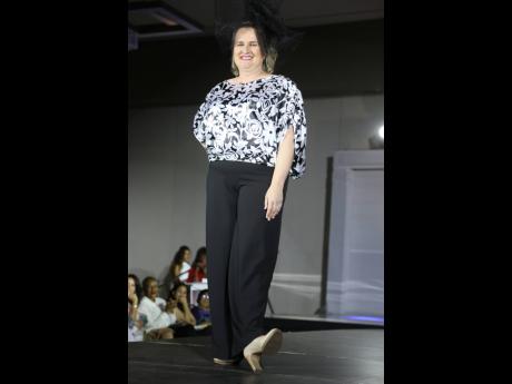 Canadian High Commissioner to Jamaica, Emina Tudakovic, takes to the runway in the classic black and white collection from Heather Laine. 