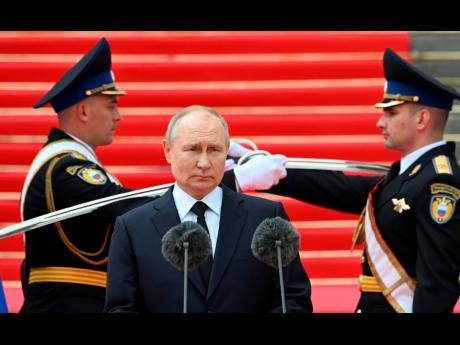 Russian President Vladimir Putin addresses members of the defence ministry, the National Guard, the interior ministry, the Federal Security Service and the Federal Guard Service at the Kremlin in Moscow.