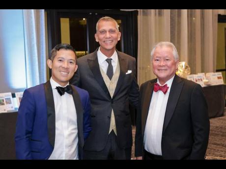 Craig Hendrickson, director of sales and marketing, Continental Baking Company; Sagicor Group Chairman Peter Melhado; and Gary ‘Butch’ Hendrickson, chairman and CEO, Continental Baking Company, enjoying a wonderful evening at the American Friends of Ja