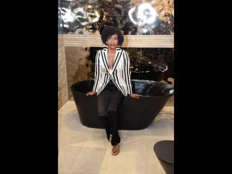 Credit: Antoine Lodge If Walls Could Talk Interiors’ transformation specialist and designer, Joelle Smith, sits pretty, proudly showcasing her three-in-one lavatory inspo, decked with all the lavish fixes and feels.