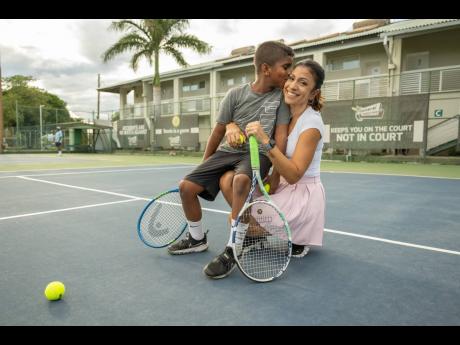 Sunday afternoon tennis matches at the Liguanea Club is this mother-son duo’s favourite past time. 