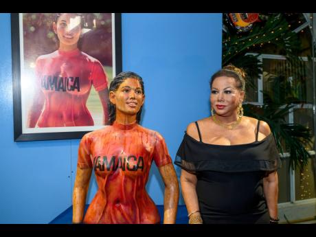 The striking resemblance to herself. Sintra Bronte stands next to her statue commissioned by hotelier Christopher Issa.