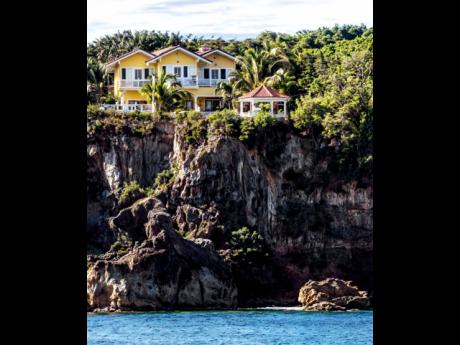 Credit: Contributed This clifftop observatory house reveals its full splendour only when viewed from the sea.