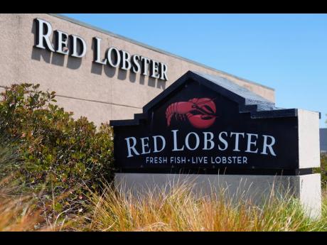 Credit: AP Jeff Chiu Signs for a Red Lobster restaurant are seen in San Bruno, California, on Tuesday, May 14, 2024.