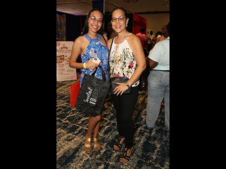 Making life sweeter by closing off the weekend on a high note are this mother-and-daughter pair, Judy (right) and Alyssa Thompson.