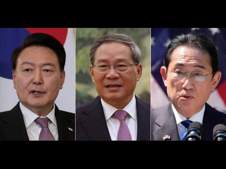In this combination of photos, South Korean President Yoon Suk Yeol (left) makes some remarks to the media in London on November 22, 2023, Chinese Premier Li Qiang (centre) waits at the Great Hall of the People in Beijing on April 7, 2024, and Japanese Pri