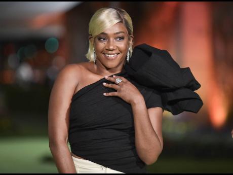 Credit: AP Tiffany Haddish disclosed that her decision to kick drink has also helped her body.