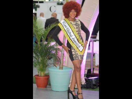 Credit: Paul Williams Miss Global Jamaica Rich-Ann Vernon representing ‘The Rock’ in style.